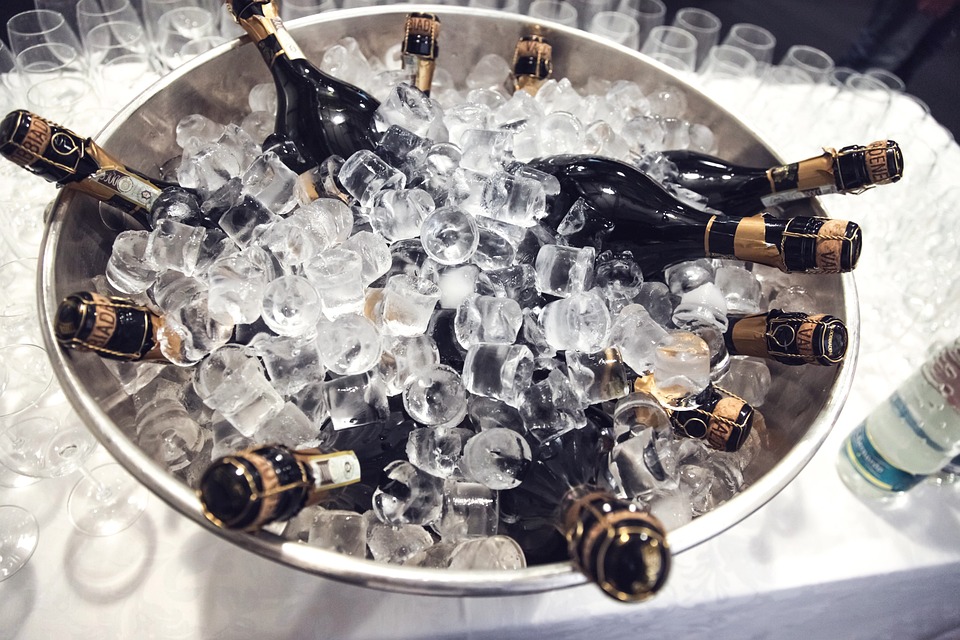Bottles of Champagne with Ice Cubes