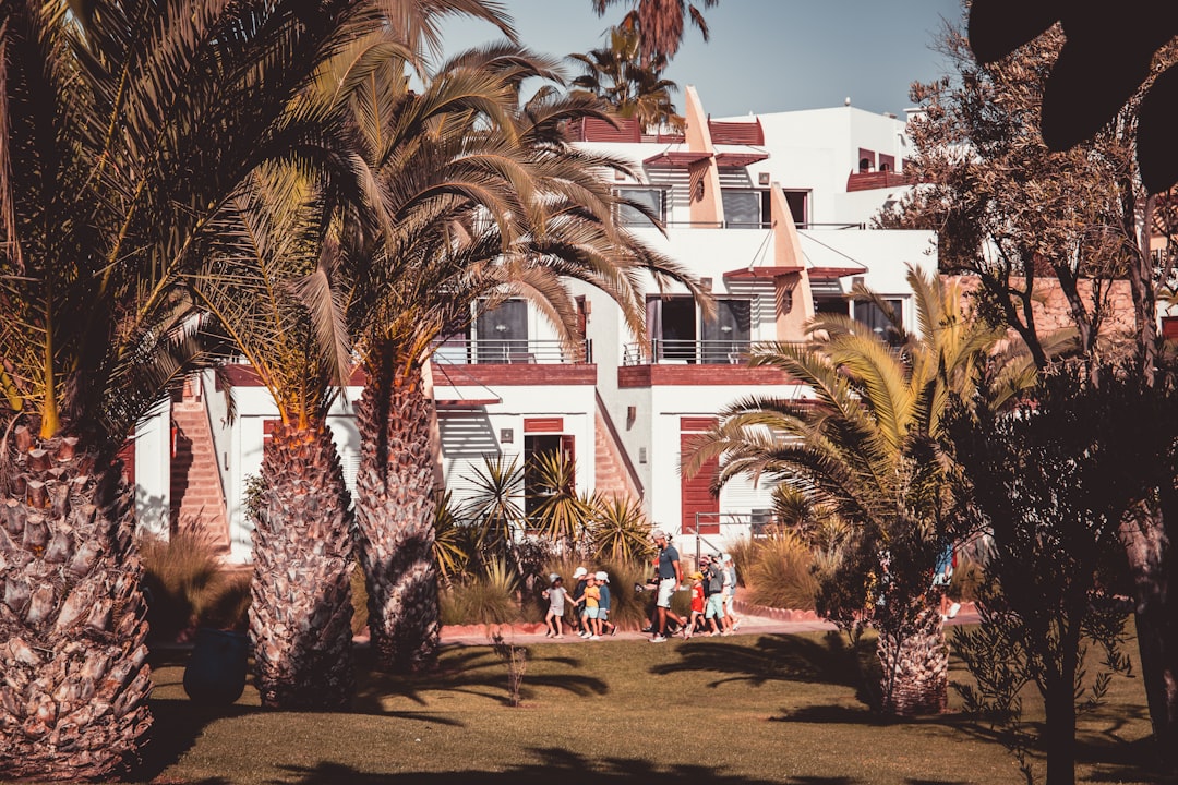 A Guide to Exploring Agadir in Morocco 3 people walking on street near buildings during daytime
